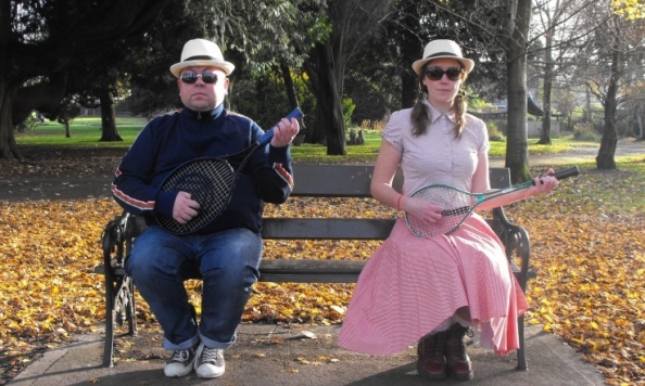 Fred and Alice Guitars sitting on Park Bench smallweb