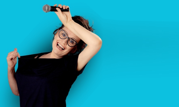 Anne Gildea mic on blue bg